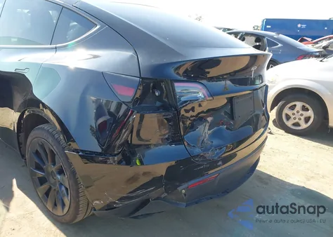 2023 Tesla Model Y Awd/Long Range Dual Motor All-Wheel Drive z USA, uszkodzony, nr VIN 7SAYGDEE1PA025933